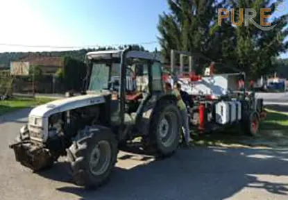 Hemp Harvester On The Road mounted by a tractor